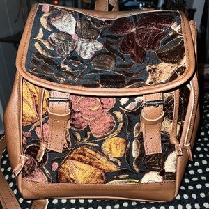 Handmade leather backpack embroidered